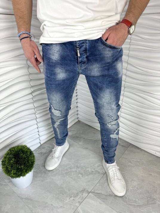 Мъжки дънки в син цвят с надран ефект 